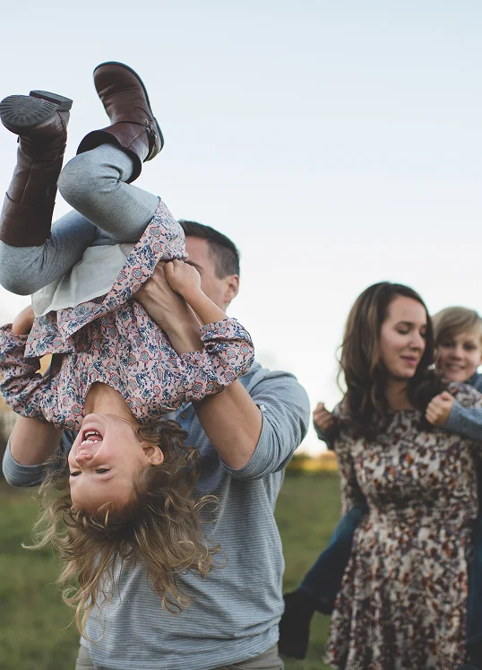 Young family in a Michigan field